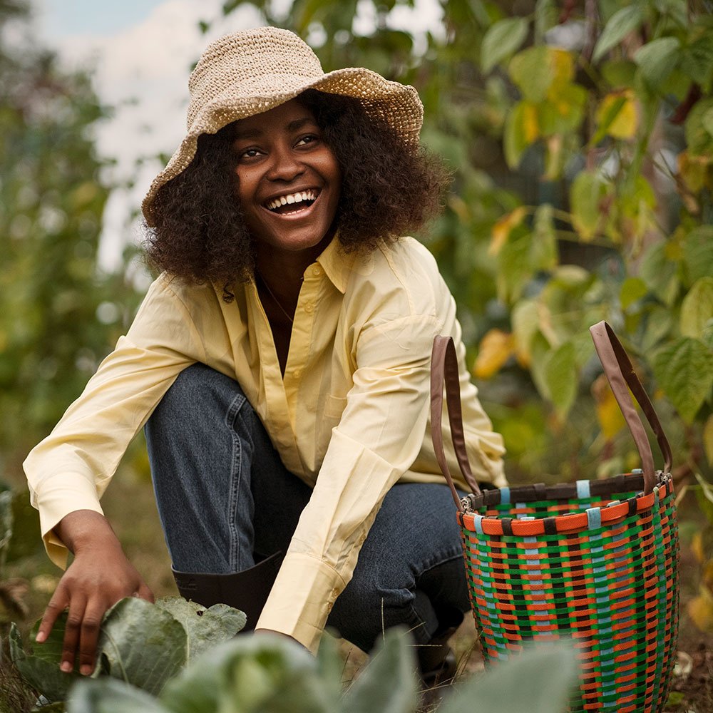 full shot smiley woman working outdoors